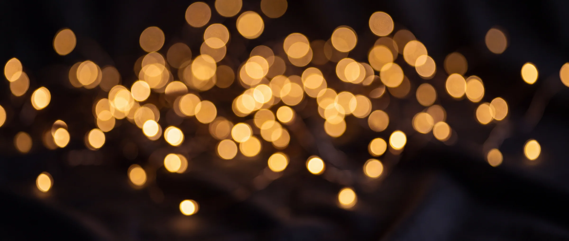 Warm points of light thrown far out of focus